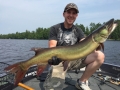 Steve Heiting's son, Brant, with his largest Wisconsin musky.