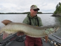 Kevin Schmidt with his first big minnowbait musky in 15 minutes in August 2018.