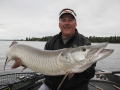 Steve with a nice fish caught off a main lake point on a Mepps H210.