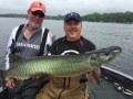 A 7-inch Slammer was too much for this Indiana musky caught by Steve. With him is Shimano rep John Stone.