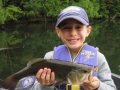 Grandson Conner with a nice largemouth bass.