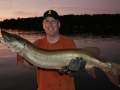 Steve's friend Kevin Lynch with his personal best musky, caught on a topwater.